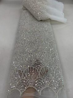 This high quality Fabric is measured in 5 Yards With Embroidered Beading and Sequin. It is soft, very delicate and beautiful. This high Quality Fabric is made with Fashion embroidered rhinestones can be used in making party wedding dresses, skirts, shawls, scarves and other other fashion apparels as you would like. Size : Length : 5 yards (180 inch). Width: 50 inch (Please allow slight deviation for the measurement data ,±1 inch) Material: 100% Polyester, Tulle Lace Fabric, Eco-Friendly embroide Future Dusk, French Lace Wedding Dress, Nigerian Wedding Dress, Sewing Wedding Dress, Beading Netting, Beaded Lace Fabric, Lace Fabrics, Nigerian Lace, Beaded Tulle