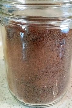 a glass jar filled with lots of brown stuff