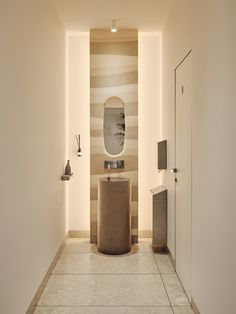 the bathroom is clean and ready to be used as a washroom for someone's belongings