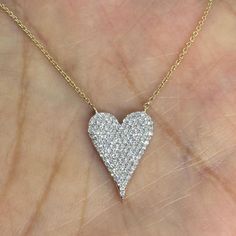 Beautiful Diamond Heart Necklace.  Excellent craftsmanship, all diamonds are set nice and smooth and the heart lays perfectly on the neck.  The diamonds are all clear and very sparkling.  The shape of this diamond heart is very pretty and different; love the puff shape!  The chain comes with adjustable loops so you can wear at 18.5", 17.25", or 16.25" lengths with strong lobster claw lock.  Heart measures about 17 x 12mm.  Choose yellow or white gold.    Genuine Full Cut Round brilliant cut diam Heart Diamond Necklace, Angel Guardian, Diamond Heart Necklace, Diamond Heart Pendant Necklace, Gold Angel, Heart Necklace Diamond, Heart Diamond, Heart Pendant Diamond, Jewelry Business