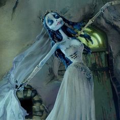 a painting of a woman dressed as corpse bride