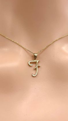 Wear one at a time or combined with your initials, your crush's, your pet's and while we're at it, your best friend's too. Showcase your favorites in gold layers. Made in Montréal Canada 🇨🇦. Details: Letter: F Gold: 10K Solid Gold Size: 15mm approximately  Weight: 0.62g approximately  Chain: 0.85mm Diamond Cut Cable Chain Length: 16-24 inches  Condition: New and Inspected for Quality Assurance  Please understand that the photos are ENLARGED to show detail for your benefit- please use the measu F Alphabet, F Names, All Letters, Gold Locket, Letter F, Women Christmas, Name Jewelry, Birthday Gifts For Women, Script Font