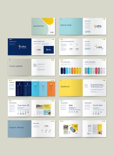 a bunch of different types of business cards and brochures on a gray background