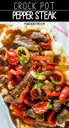 a white plate topped with meat and veggies covered in gravy on top of mashed potatoes