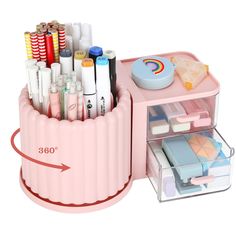 an image of a pink desk organizer with pens and pencils in the holder on top