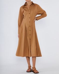 The Mattea Cotton Poplin Shirt Dress by Amelius is a classic transeasonal dress with tailoring sentiments. Panel detailing falls into an A-line skirt alongside suit-shirt sleeves. Elasticated shirring for a comfort fit. Cut in 100% cotton po Poplin Shirt Dress, Layered Fits, Suit Shirt, Cotton Poplin Shirt, Suit Shirts, Poplin Shirt, Dress With Boots