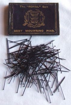 mourning pins.Because of strict mourning rituals, when a woman was in mourning, she couldn’t wear or display anything bright or flashy — even shiny pins keeping her clothing together. So women would use these mourning pins to button their clothes. The pins resemble thin black nails. Swamp Witch, Dolly Kei, Momento Mori, Material Textures, Post Mortem, Intj, Memento Mori, Vintage Clothes, Historical Fashion