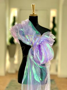 Bring vibrant energy and a touch of glamour to your next creative project with this eye-catching iridescent Organza fabric. Make a striking impression by creating dazzling garments, statement decorations, or unique craft items. The iridescent quality adds a mesmerizing dimension, catching and reflecting light for a truly captivating effect. Whether you're a fashion designer, DIY enthusiast, or event decorator, this neon pink iridescent organza fabric is a must-have for adding a pop of color and shimmer to your creations. Width: 59 inches Iridescent Ball Gown, Iridescent Fabric Dress, Liquid Organza, Iridescent Pearl Fabric, Glamorous Iridescent Sequin Fabric With Glitter, Iridescent Organza, Fairytale Ball, Glamorous Iridescent Shimmer Sequin Fabric, Ball Inspiration