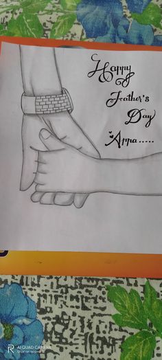 a drawing of two hands holding each other with the words happy father's day on it