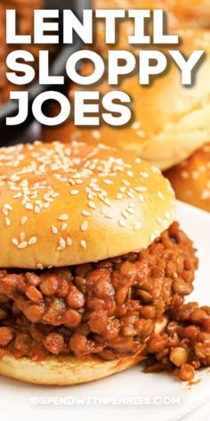 a sloppy joe sandwich on a plate with the words lentil sloppy joes above it