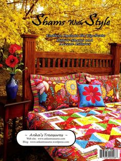 a magazine cover with an image of a bed in the background and flowers on it