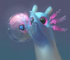 a close up of a person's hand holding a bubble with an animal on it