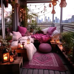 a balcony with lots of plants and candles on the floor, lights strung from the ceiling