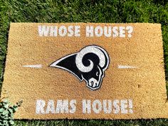 a door mat that says who's house? with rams logo on the front