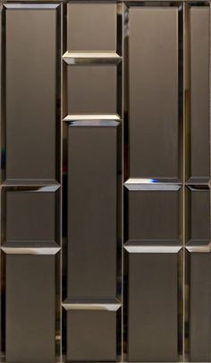 an abstract metal wall with squares and rectangles