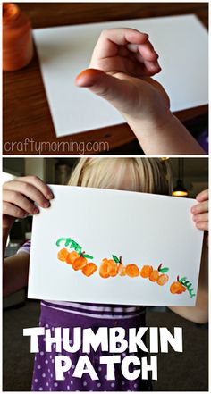 a child holding up a piece of paper with oranges on it and the words pumpkin patch