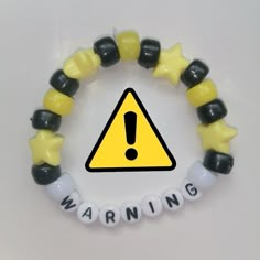 Things To Put On A Bracelet, Artist Bracelet Ideas, Kandi South Park, Pony Beads Bracelet Ideas, Band Kandi Bracelets, Kandi Word Ideas, Simple Kandi Ideas, Bracelet Ideas With Words, Rave Kandi Bracelets Ideas