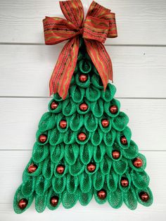 a christmas tree made out of green paper