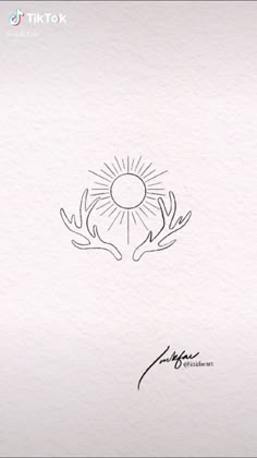 a drawing of a sun and two hands