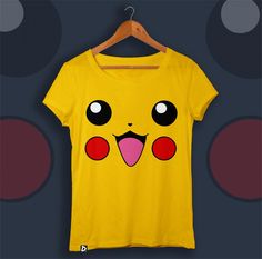 a yellow t - shirt with an image of pikachu's face on it