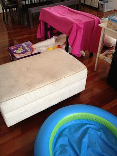 a child's play room with toys on the floor