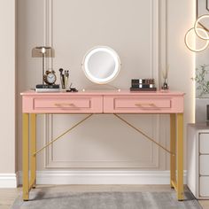 a pink desk with two drawers and a round mirror on the wall next to it