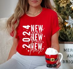 New Year T-Shirt,2024 Happy New Year T-Shirt,New Year T-Shirt,New Years Gift,2024 Christmas T-Shirt,New Years Eve,Hello 2024,New Years Party We have designed fun, enjoyable and stylish t-shirts to make you happy with small details on Christmas. Don't forget to check out our other t-shirts 😊 ❀DETAIL❀ For printing, we use Bella Canvas and Gildan SoftStyle brand shirts, which are the best in the industry. *Bella Canvas -unisex size -4.2 oz. -Solid colors are 100% Combed Cotton and Ring-Spun Cotton Group New Years Shirts, 2024 New Year Shirt Design, New Year Red Letter Print T-shirt, Red Letter Print T-shirt For New Year, Shirts Detail, Hello 2024, Happy New Year Shirt, New Years Shirts, T Shorts