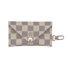 a white and blue checkered wallet with a metal keychain attached to it