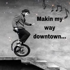 a man riding a bike down the side of a flight of stairs with musical notes in the background