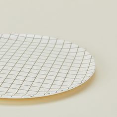 a white plate sitting on top of a table