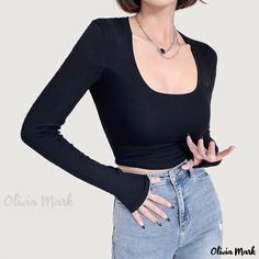 Olivia Mark - Professional Black Nylon Crop Top: Sexy High-Waisted, Low-Cut, Long Sleeve Shirt with Exposed Midriff Solid Color Club Tops In Elastane, Fitted Solid Color Club Top, Fitted Solid Color Top For Club, Fitted Long Sleeve Top With Built-in Bra, High Waist Stretch Black Crop Top, Fitted Low-cut Top For Night Out, High Stretch Solid Color Crop Top For Club, Fitted Trendy Crop Top, Black Fitted Low-cut Top