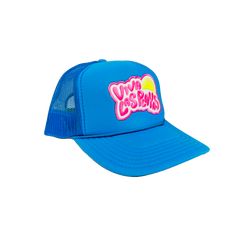 a blue trucker hat with pink lettering on the front