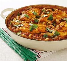 a large pot filled with food on top of a table