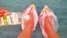 a person with their feet in plastic bags