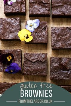 chocolate brownies with pansies on top and the words gluten free brownies