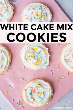 white cake mix cookies with frosting and sprinkles on a pink tray