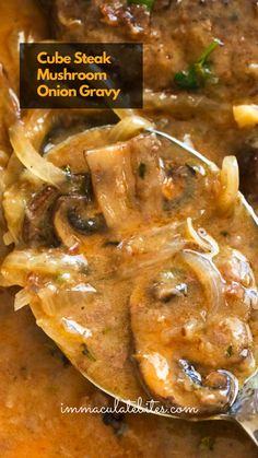 a close up of a spoon with food on it and the words cube steak mushroom onion gravy