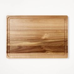 a wooden cutting board on a white background