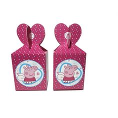 two peppo pig shaped boxes with hearts on them