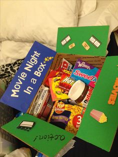 an open box filled with candy and other items