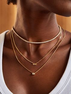 Do you see a certain sequence of numbers everywhere you go? It might be an angel number, sending you a subliminal yet meaningful message from the universe. Pay an ode to these special symbols with our 18K Gold Angel Number Custom Nameplate Necklace, available in an all-gold or gold with pavé version. Choose the repeating number 0-9 that you keep seeing, and it'll be crafted in a row of three. See our key for the meaning and message behind each angel number. This necklace is crafted with 18K gold Front Neck Tattoo, Nameplate Necklace Gold, Message From The Universe, Number Jewelry, Nameplate Necklace Silver, Personalized Gold Necklace, Jewelry Stacking, Unique Words Definitions, Words Definitions