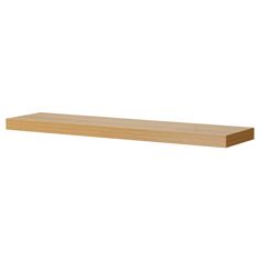 a wooden shelf on a white background