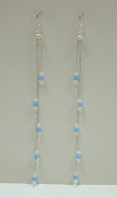 "Sterling Silver 925 4mm OPAL Beads with 4mm Sterling Silver 925 Mesh Net Beads Beaded Five Strands EARRINGS ( BSQ-040 ) Metal of the Chains: Sterling Silver 925 Thickness of the Chains: about 0.8mm Metal of the Beads: Sterling Silver 925 Metal Beads: Sterling Silver 925 4mm Mesh Net Beads Gemstone Beads: Created 4mm OPAL Color of the Stones: Light Blue, Dark Blue, Light Green, Dark Green, White or Pink. Please select from the Drop Down Menu Fastenings: Sterling Silver 925 Fish Hooks with Ball L Wire Jewelry Rings, Everyday Wear Jewelry, Silver Chain Earrings, Weaving Tutorial, Unusual Earrings, Fish Hooks, Unique Diamond Rings, Earring Ideas, Opal Color