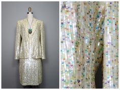 "This is a RARE and AMAZING vintage dress suit! Both pieces are beautifully detailed with sequins all over and accented with beading along the hems. It's in PERFECT condition! Note, measurements are taken with the front brought together, there are no closures on the blazer. Bust - 36/38\" Shoulders - 16\" Sleeves - 24.5\" Length of Jacket - 26\" Skirt Waist - 27\" Hips - 38\" Length of Skirt - 23\" Tag Size - 4 This item comes from a pet-free and smoke-free home. If you would like more info or h Spring Embellished Fitted Sets, Spring Embellished Party Sets, Spring Party Embellished Sets, Formal Fitted Sequin Sets, Spring Evening Sets With Sequins, Elegant Spring Celebration Sets, Embellished Formal Sets For Summer, Fitted Sequin Sets For Spring, Spring Fitted Sequin Sets