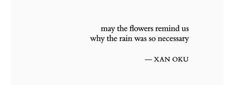 an image of a quote with the words may the flowers remind us why the rain was so necessary