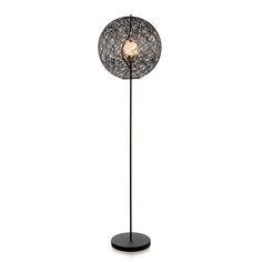 a black floor lamp with a light bulb on it's base and a wire ball shade