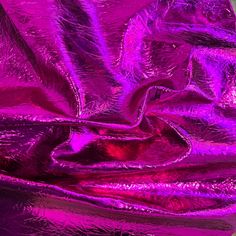 purple metallic fabric is shown in close up