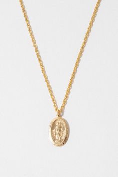 One of our all-time best-selling necklaces because of its quality, simplicity and traditional Italian design. This necklace is adorned with a traditional religious "Miraculous Mary" double-sided pendant on a detailed rope chain. 14k gold-filled or sterling silver pendant. 14K Gold-Filled or Sterling Silver Twisted Rope Chain - Measures 18 Inches or 20 Inches Models wearing 18 inches Crosses Jewelry, Gold Coin Jewelry, Child Of Wild, Petite Necklace, Mary Necklace, Peace Necklace, Travel Necklace, Witchy Home, Dainty Gold Necklace