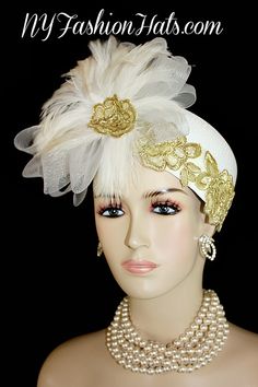 Women's White Pillbox Fashion Designer Haute Couture Hat Trimmed With A Large White Crinoline Horse Hair Bow, Enhanced With Expensive White Rooster Feathers. Metallic Gold Embroidered Flower Appliques Are Placed Around The Crown Of This Fashion Hat, As Well As Placed In The Center Of The Feathers. This Formal Hat Can Be Worn In Different Positions. This ladies hat is appropriate to wear for the Kentucky Derby, Melbourne Cup, Royal Ascot, horse races, Saratoga racing, Church, weddings, and specia Gatsby Style Wedding Hat And Headpieces, Gatsby Style Costume Hat For Wedding, Adjustable Hat Headpiece For Ceremonies, Adjustable Wedding Headband Costume, Adjustable Hat For Ceremony, Adjustable Headband For Ceremony, Gatsby Style Wedding Fascinator With Short Brim, Adjustable Ceremony Headband, Adjustable Gatsby Mini Hats For Vintage Events