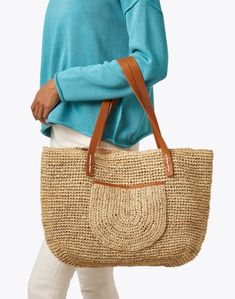 Lending a tropical twist to your everyday carryall, Laggo's Casablanca bag is getaway-ready. The roomy tote silhouette is crafted from woven raffia, finished with leather handles, and lined in nylon for the perfect blend of fashion and function. Wear yours over your shoulder with your favorite warm weather ensembles. Raffia Tote Bag, Tropical Twist, Woven Raffia, Leather Handles, Casablanca, Leather Handle, Warm Weather, Twist